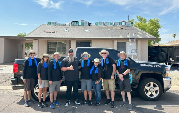 Eco Roofing Solutions and RWC Building Products teams work with house of Refuge in Mesa, Arizona to provide three Malarkey roofs to families in need.