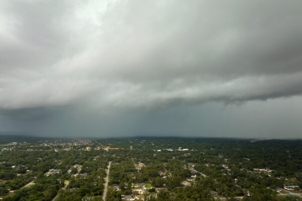 View of storm clouds over a suburban city